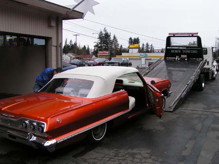 1963_Chevrolet_Impala_Leaving_Upholstery_Shop.